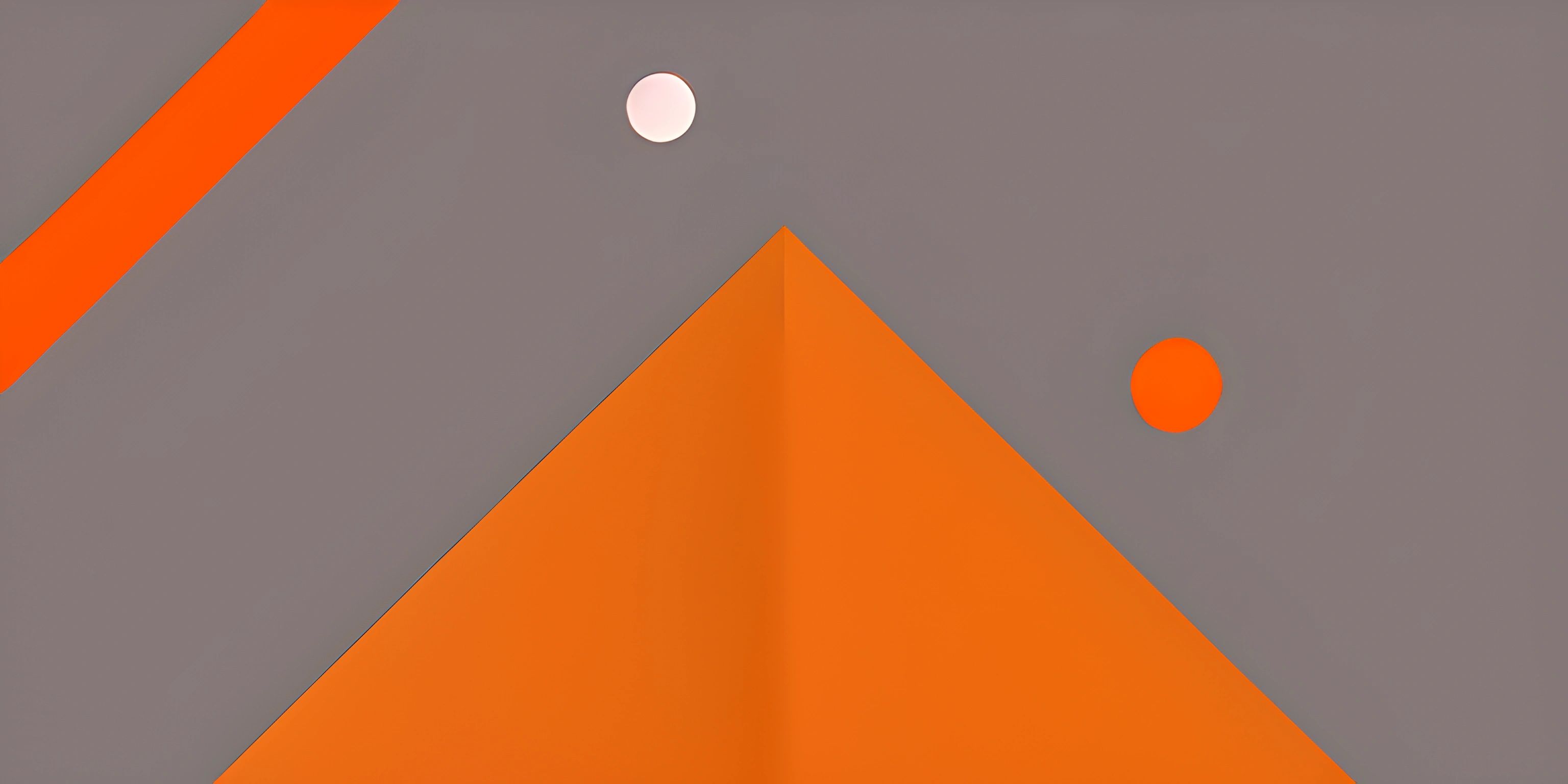 a gray, orange and black wall with a red half moon over it and two squares above them