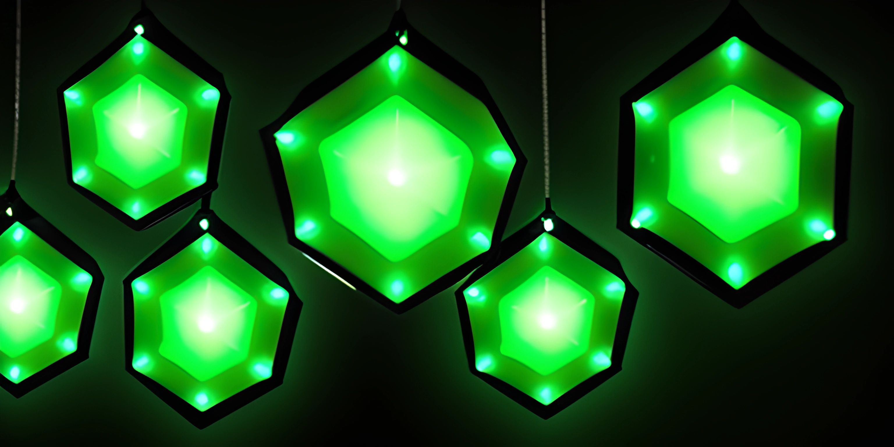 a bunch of green lighted pieces hanging in the dark room above the floor of an office building