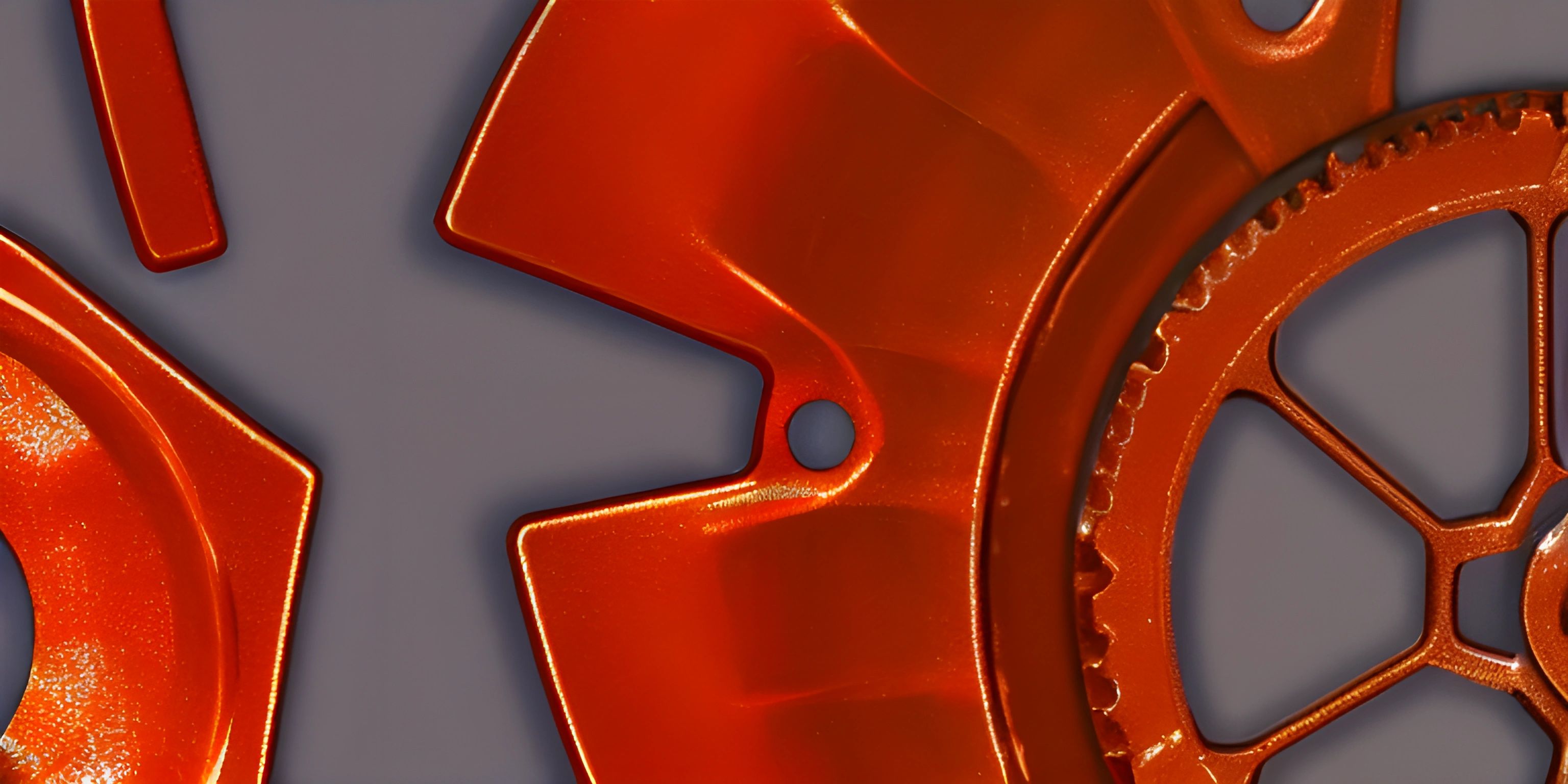 two rusted gears are next to each other on the wall of an industrial facility